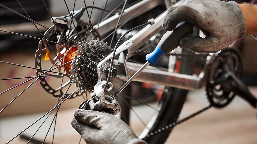 Illustrative photograph of bicycle maintenance.